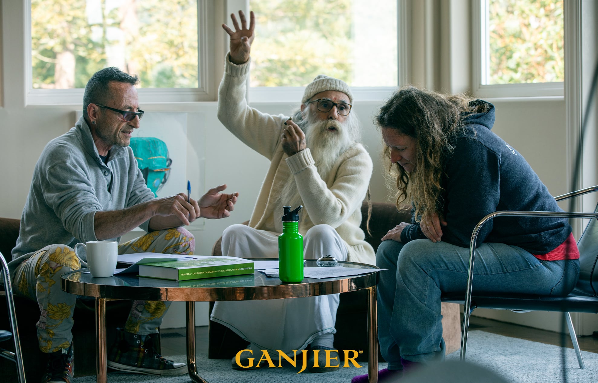 three cannabis experts talking around a table